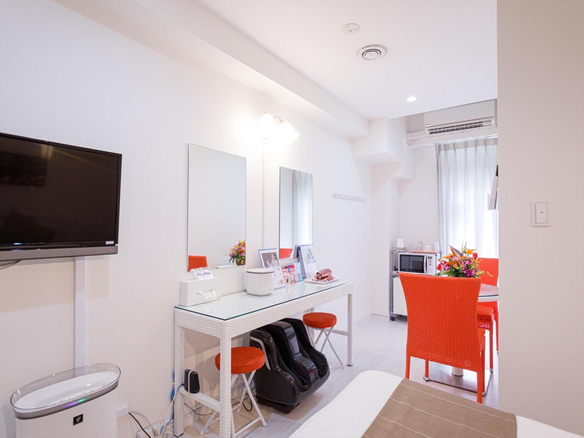かりゆしコンドミニアムリゾート那覇スカイリビングホテル旭橋駅前 Naha Habitación foto